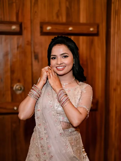 A close-up of the bride's happy face. The makeup is subtle and enhances her natural beauty, which is my goal for every client.