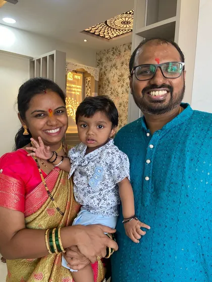 A happy family in their new, blessed home is our ultimate goal. This beautiful portrait of the Pakhare family during their housewarming ceremony is a testament to the peace and happiness a Vastu-aligned home can bring.