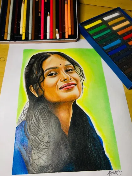 Another view of the completed portrait, showing the materials used. It's a combination of skill and professional tools that brings these sketches to life.