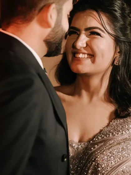 It's all about the real, unscripted moments. This close-up captures the pure joy and love in a bride's smile during her engagement, showcasing my focus on candid wedding photography.