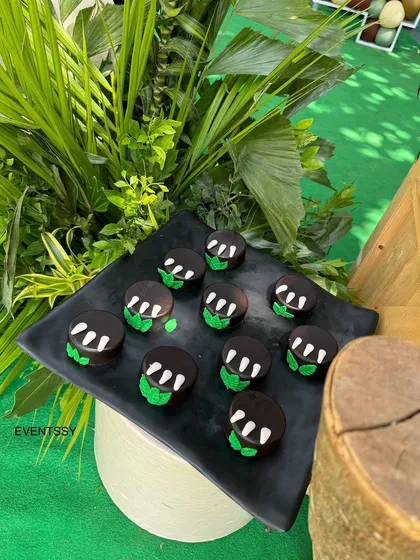 Dinosaur egg themed treats, showcasing the creative and detailed catering options available.