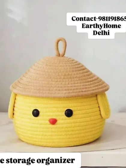 A closer look at the cute storage organizer, showing the detailed rope work and adorable face.