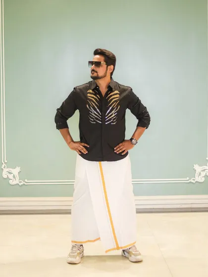 A confident pose in my South Indian attire. Being able to host for Tulu, Marwari, Gujarati, and other communities is a specialty of mine.