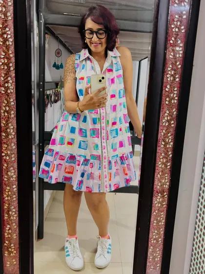 The full view of my colorful weekend dress, paired with comfy sneakers.