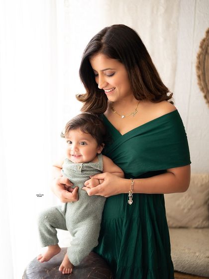 A beautiful portrait of a mother and her baby, full of warmth and affection.