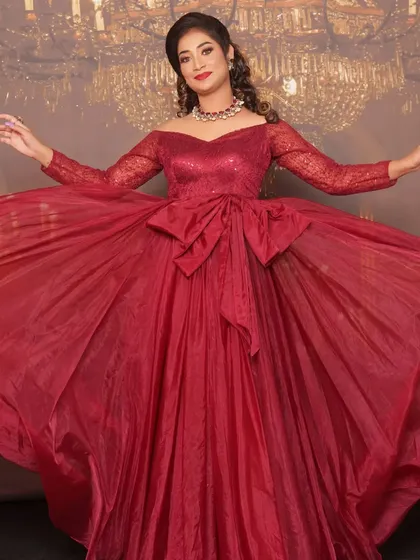 For a reception or cocktail party, we can go for full-on glamour. This stunning red gown called for a dramatic look with a golden smokey eye, bold red lips, and soft curls. It’s all about creating a look that makes you feel like the star of the evening.