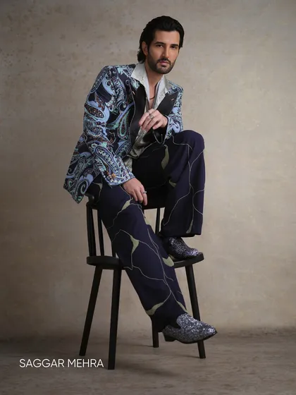 Actor Aditya Seal in a printed tuxedo, showcasing a bold yet sophisticated approach to evening wear. This demonstrates how I play with pattern and colour to create unique, personality-driven formal pieces that stand out.