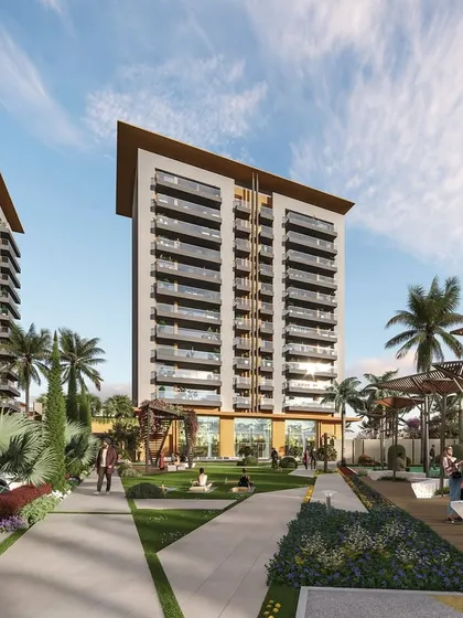 The design for Gulnaar Zenium includes beautifully landscaped pathways and seating areas, creating an environment for elevated community living.