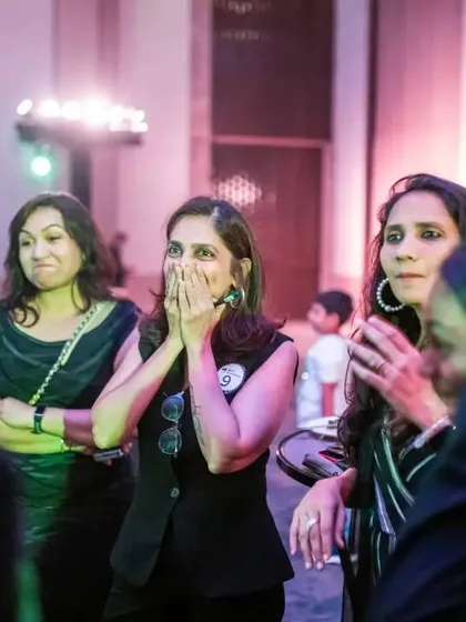 A classic "hands over the mouth" moment of shock from the audience. These are the reactions that tell me the magic has truly hit home.