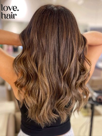 Sugar, honey, and serotonin. This beautiful bleach and tone balayage creates a soft, blended look with warm, sweet tones.