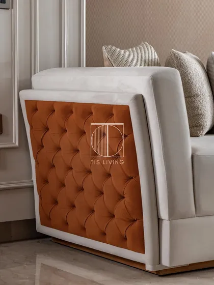 The difference is in the details. This close-up shows the side-layer quilting on a sofa we crafted. It's this level of precision and refinement, turning a simple silhouette into something extraordinary, that defines our work. We ensure every stitch and tuft aligns with your design's intent.