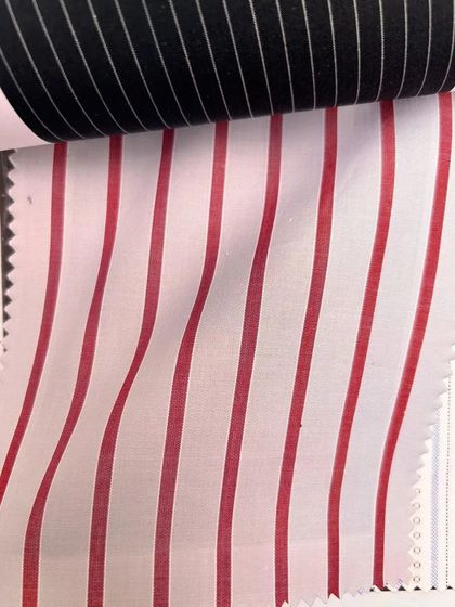 Bold red and white stripes for a statement shirt. We encourage our clients to express their personality through their fabric choices.