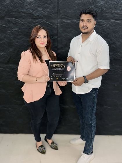 So happy to present this certificate to a talented and hardworking student. Welcome to the world of professional hairstyling!