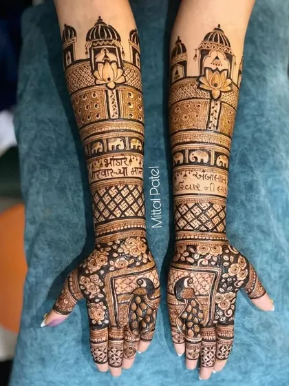 This full bridal design is a tribute to tradition, featuring palace architecture, elephants, and beautiful peacocks on the palms. The Sanskrit script adds a sacred and personal element to the artwork.