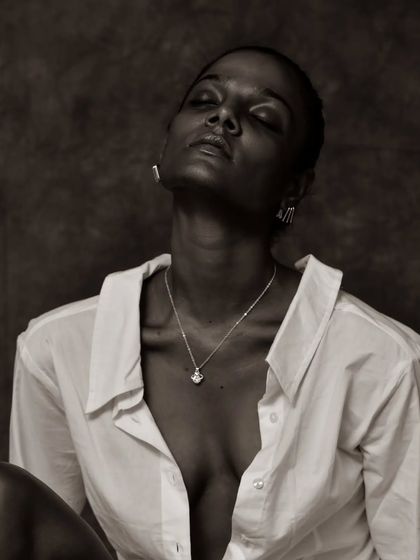 An eyes-closed, serene moment captured in beautiful monochrome tones.