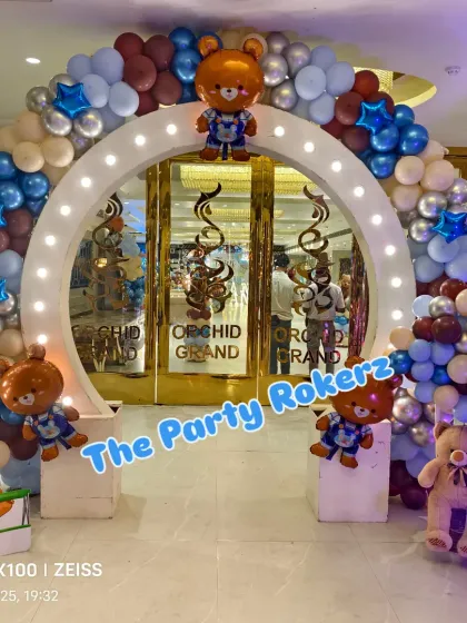 Another view of the grand entrance for the teddy bear party, showing the lighted arch and teddy bear props.