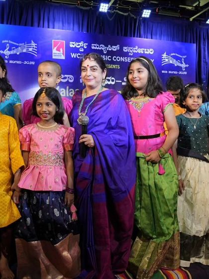 Our guru, Vidushi Smt. Sangeetha Srikishen, stands proudly with her group of young students after their performance of Shiva Bhajans and Purandara Dasa Keertane at Kalaa Sangama 2024.