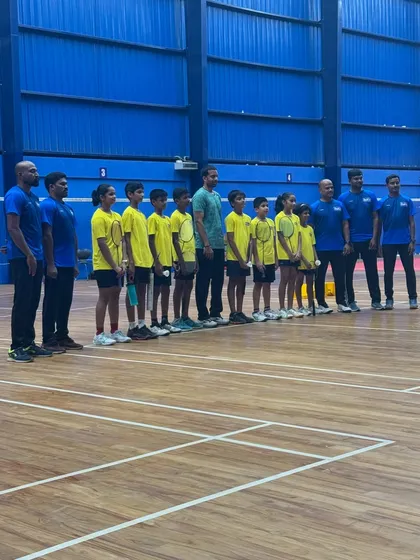 Our young players lined up on the court with their coaches and mentor, Pullela Gopichand, ready for a training session.