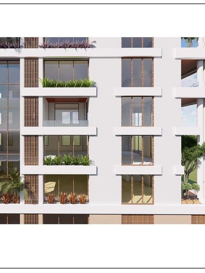 A detailed view of the facade of our Juhu apartment building. The design incorporates planters and varied window arrangements to create a dynamic and living exterior.