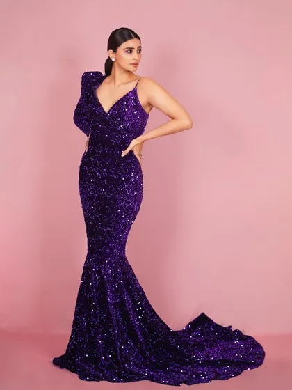 Actress Daisy Shah in a stunning purple sequin gown. This image demonstrates my studio lighting technique to make the fabric sparkle and create a look that's ready for a magazine cover or red carpet feature.