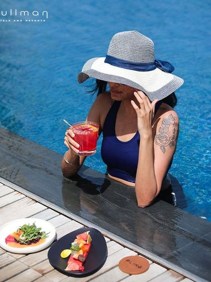Enjoy the best of both worlds with gourmet bites and refreshing cocktails served poolside at Pullman. It's the perfect way to indulge while soaking up the sun.