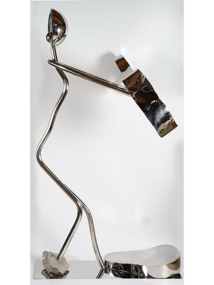 "Serenade in Steel," a figurative sculpture of a musician lost in her melody, crafted from stainless steel with stone and mixed media elements.
