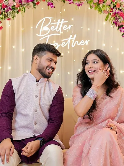A candid moment of pure laughter during a Roka ceremony. Capturing these unscripted interactions is key to telling an authentic story of your celebration.