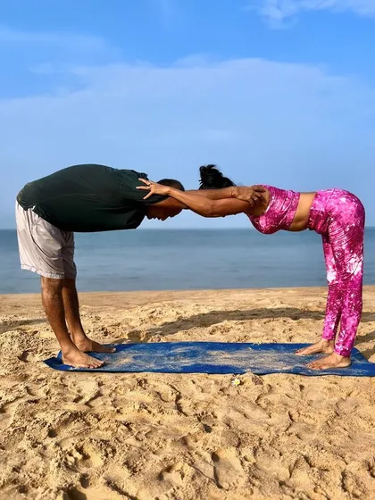 This partner forward fold creates a wonderful stretch for the spine and shoulders. It's a simple yet effective pose that encourages mutual support and alignment as we breathe and move together.