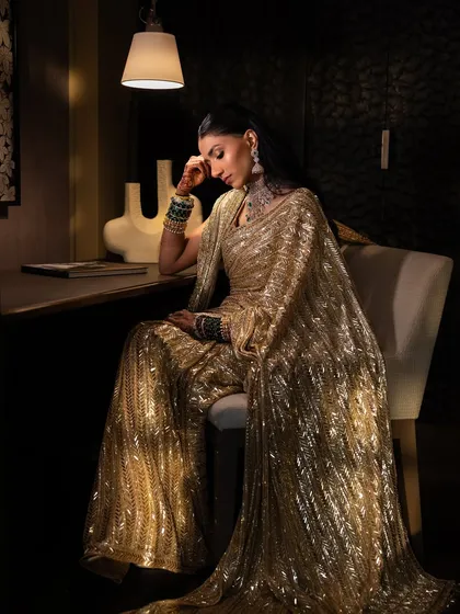Another artistic portrait. The makeup looks flawless even in dramatic lighting, a testament to our technique and product choice.