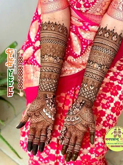A beautiful back-of-hand design with a mix of modern geometric and traditional patterns. The design flows elegantly from the wrist to the fingers.
