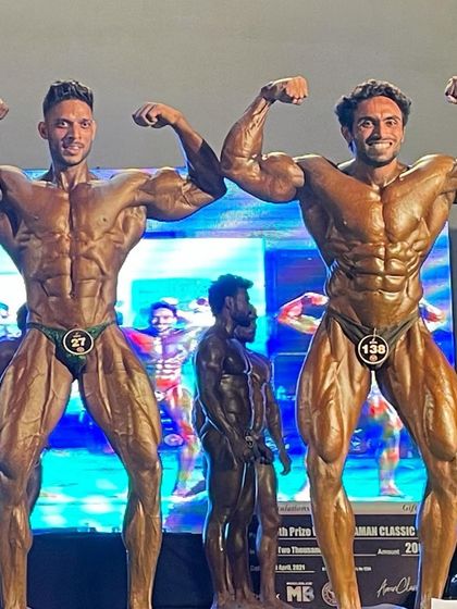 Two champions on stage. Respect for the competition.