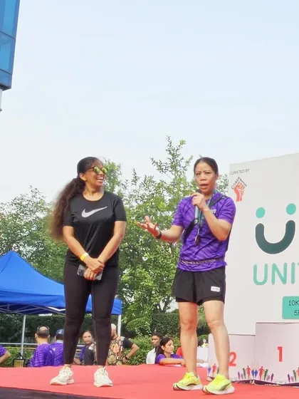A wide shot of the stage with Mary Kom at the UKG Unity Run. This shows the professional setup and scale of the events I manage for my corporate clients.