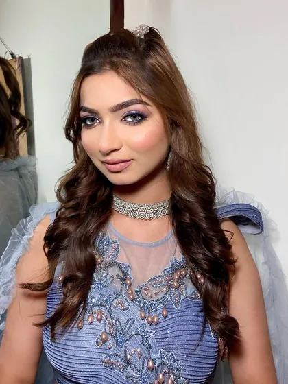 My version of a Barbie look, created for a CIDESCO event. This style is all about playful glamour with a pop of color and lots of shine.