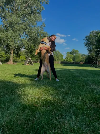 A moment of pure joy with my student dog, Doug, during my certification in the USA. He was my home away from home.