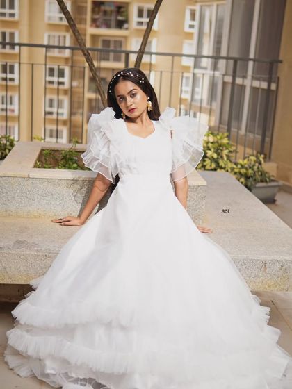 The Dress Bank - Wedding & Special Occasion Outfit Rentals White Wedding Gowns photo 6