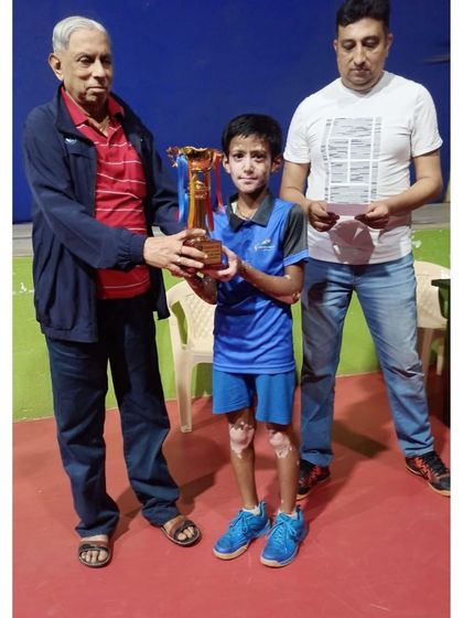 A formal moment of recognition for Vishal Vaibhav as he receives his runner-up trophy. We ensure our players get the recognition they deserve for their hard work.