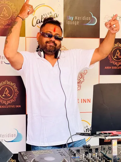 Hands in the air at the Holi party. This is my signature pose when the energy is high and the crowd is having a great time.