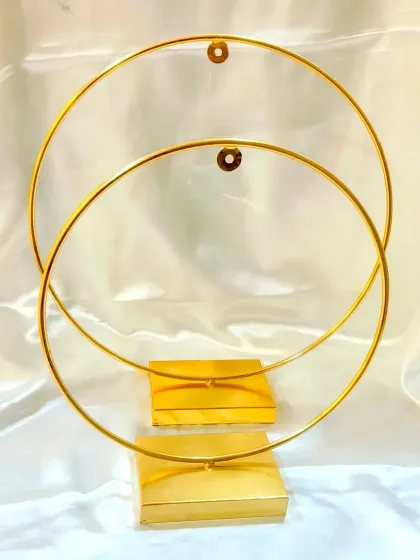 Our metal ring stands are perfect for displaying hanging platters or frames. Available in two sizes, these golden stands provide a simple and elegant way to showcase your creations.