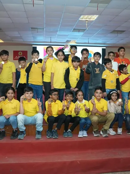 The proud faces of my champions! This is a group of my students on stage after winning medals at a national competition. Seeing their smiles and sense of achievement is the biggest reward for me.