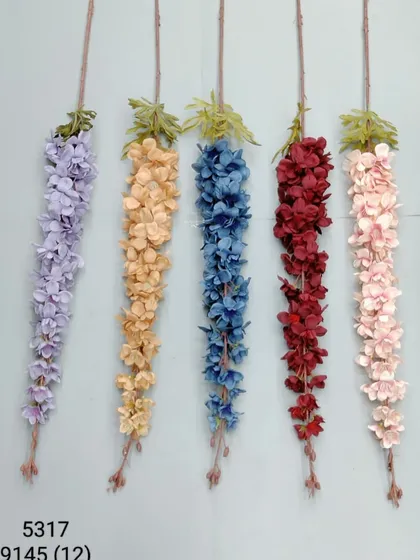 Hanging artificial flower sticks, shown here in purple, yellow, blue, red, and pink, perfect for creating floral curtains or backdrops.