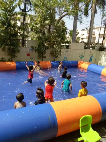 A simple inflatable pool set up for a summer party. This is perfect for younger kids to splash around and cool off in the heat.
