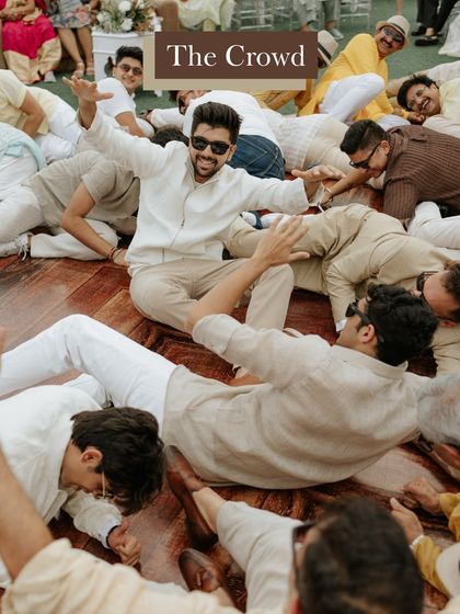 The crowd is the vibe. This photo captures the pure joy and chaos of a group of friends celebrating, a testament to the fun atmosphere we help create.