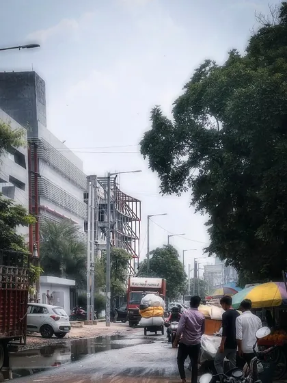 The metal facade structure seen from the street, showing how it fits into the urban context.