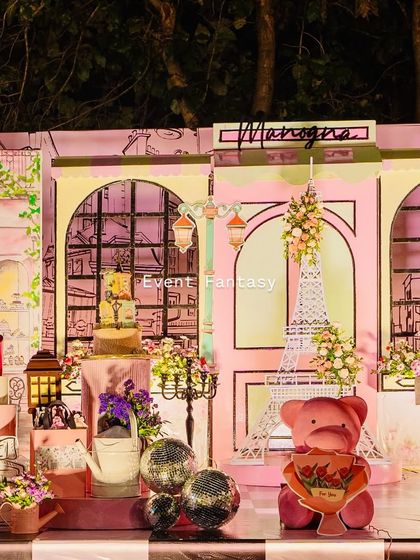 A night view of the Parisian stage, with all the elements glowing beautifully.