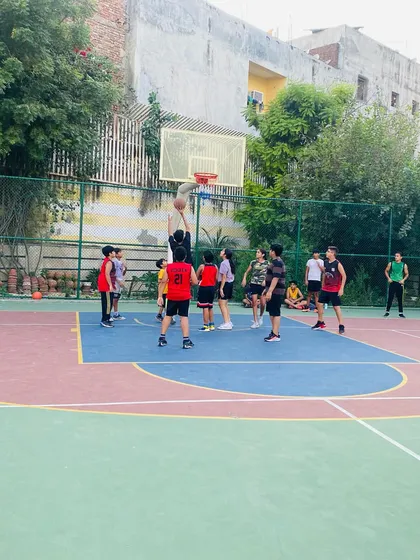 A player goes up for a shot in the paint.