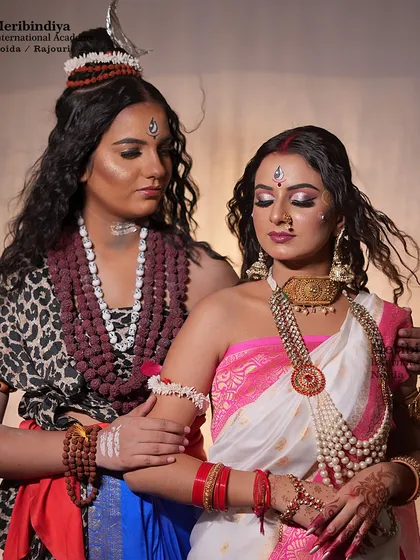 This angle shows the contrast between Shiv's ascetic look and Parvati's ornate bridal look, a study in character contrast.