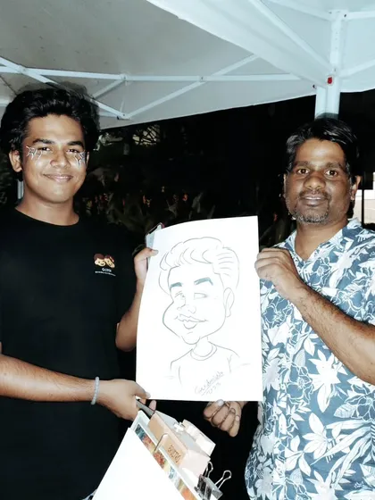Here I am with another satisfied customer. We both had a great time during this live sketch session at an evening event.