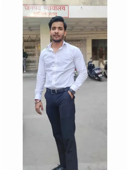 A full-length shot in my professional attire outside the Ghaziabad district court, ready for the day's proceedings.