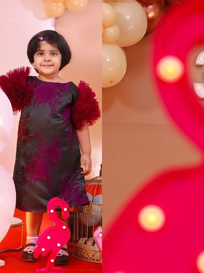 A vibrant 'Super Mario' themed birthday party, with character cutouts, a custom backdrop of the Mushroom Kingdom, and red and green balloons, ready for an adventure.