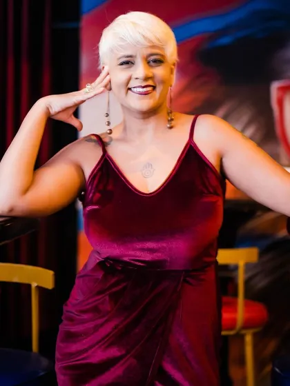 A stylish guest posing at the bar.